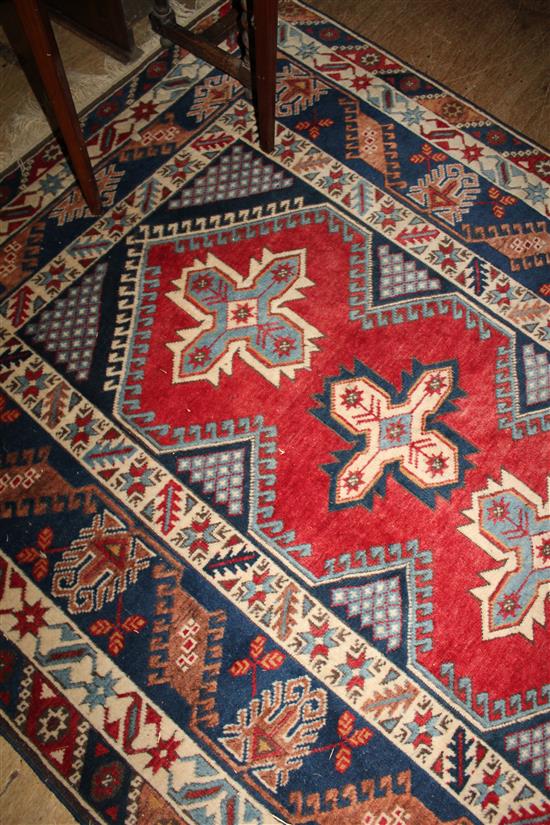 Red & blue ground Turkish rug